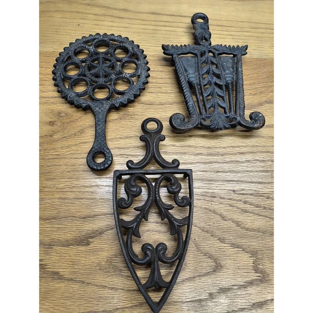 Vintage Black Cast Iron Trivets (set of 3)‎